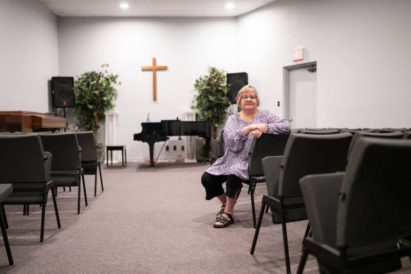 Wanda Turner sits in her church.